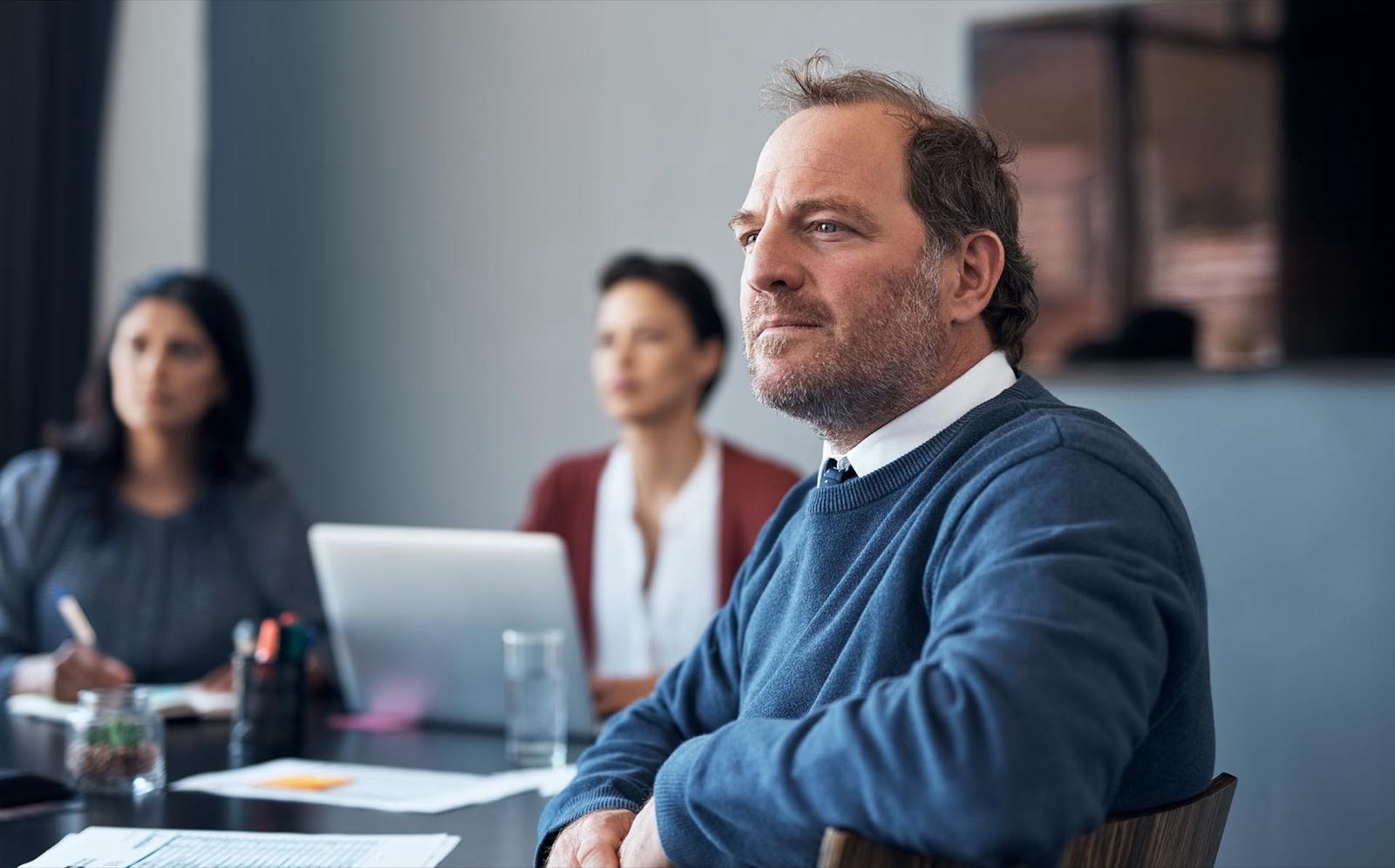 Business owner reviewing contracts